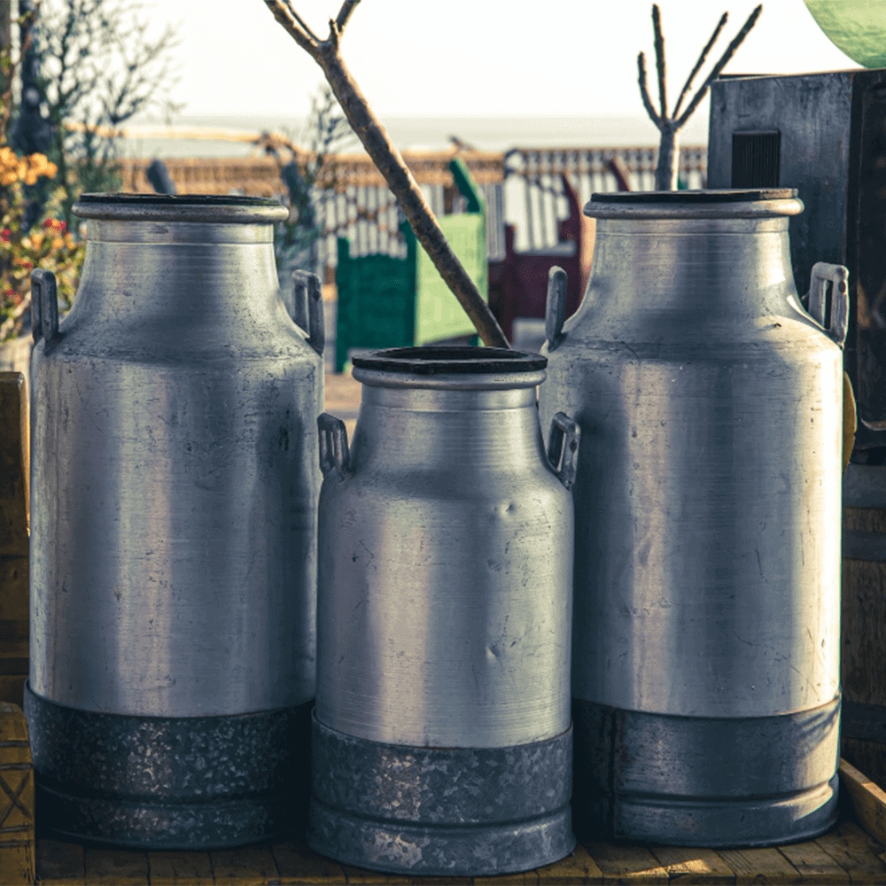 Stainless steel milk cans for dairy farming, traditional dairy equipment, durable milk containers
