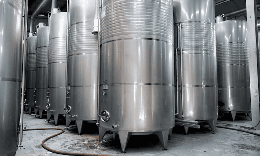 Stainless steel vertical milk storage tanks - NK Dairy Equipments