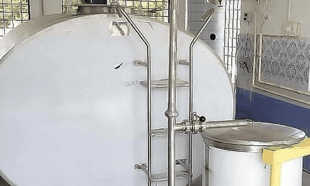 High-capacity dairy milk processing tank with stainless steel pipes and fittings - NK Dairy Equipments